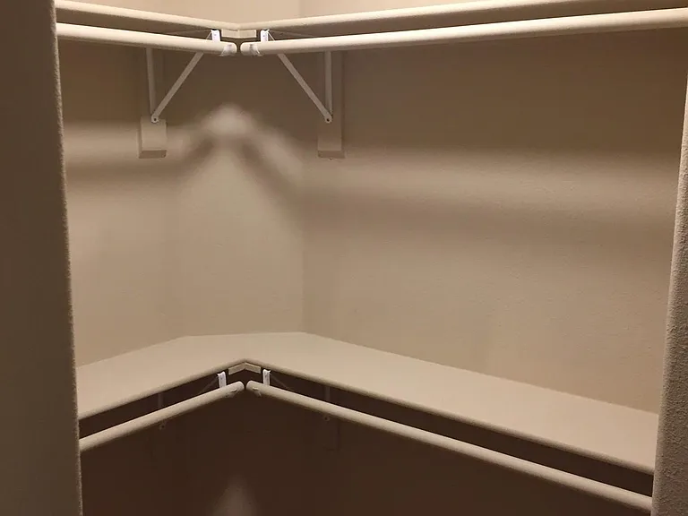 Walk-in closet in 1st master bedroom