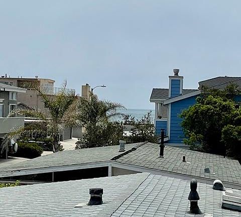 Open, airy and private second floor apartment with some ocean views