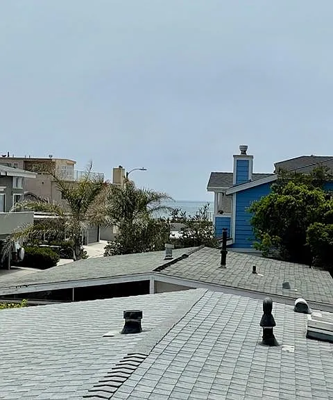 Open, airy and private second floor apartment with some ocean views