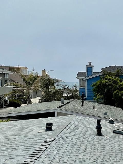 Open, airy and private second floor apartment with some ocean views