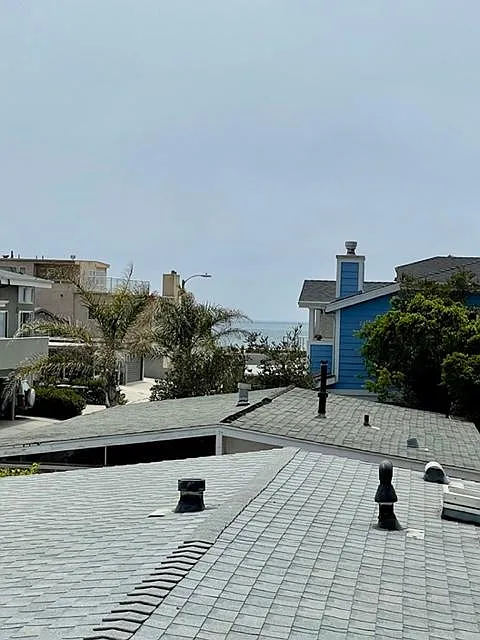 Open, airy and private second floor apartment with some ocean views