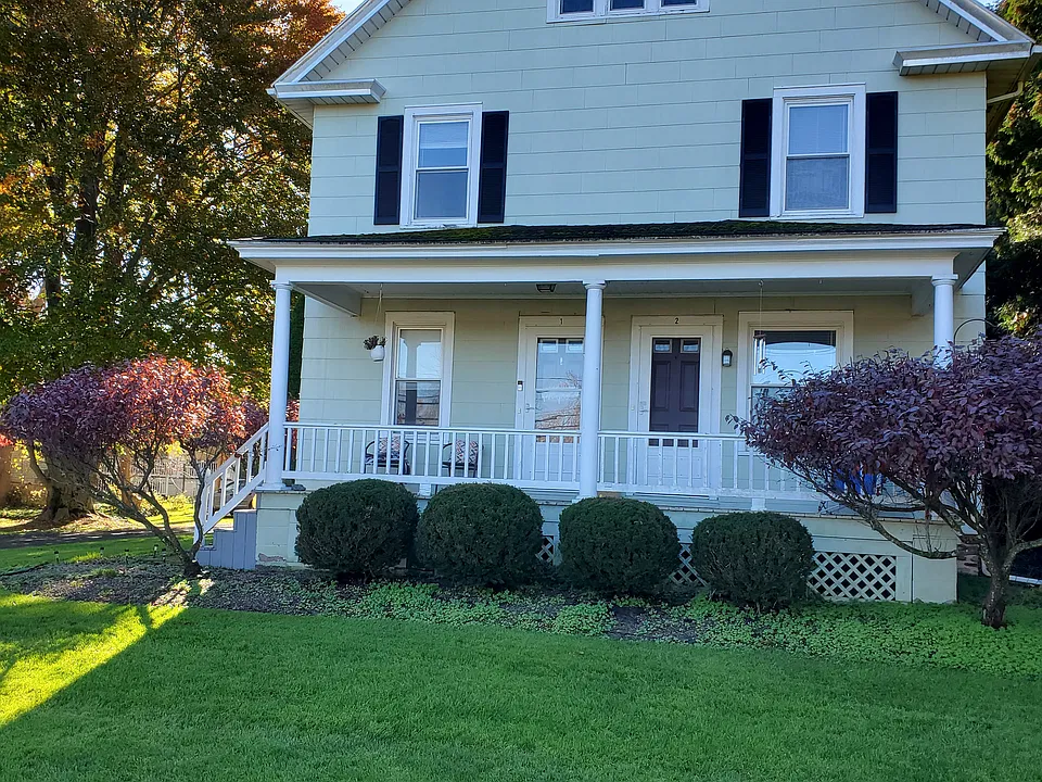 Front entrance, shared front porch