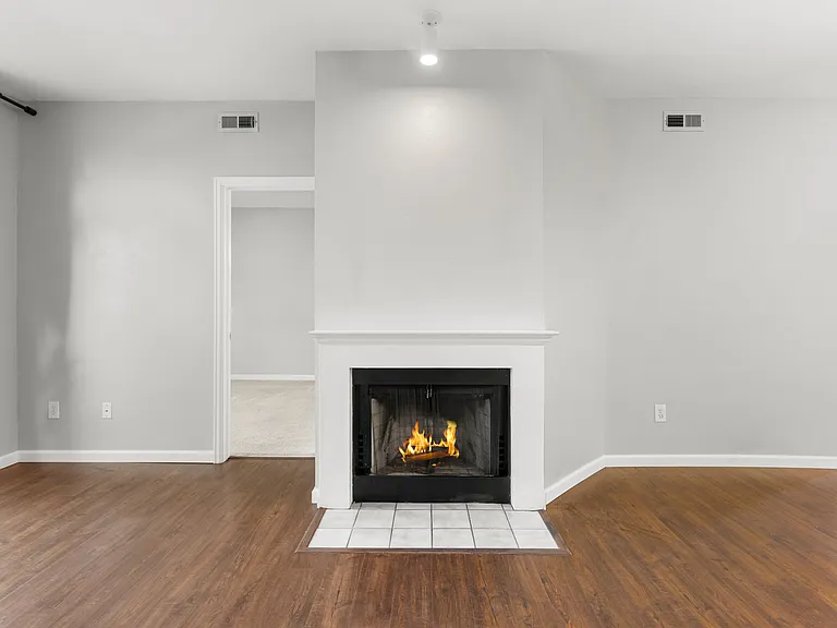 Wood-burning fireplace adds warmth and character to the main living area - perfect for Colorado evenings.