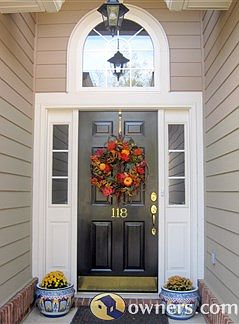 Close-up of entryway showing windows with security coating.