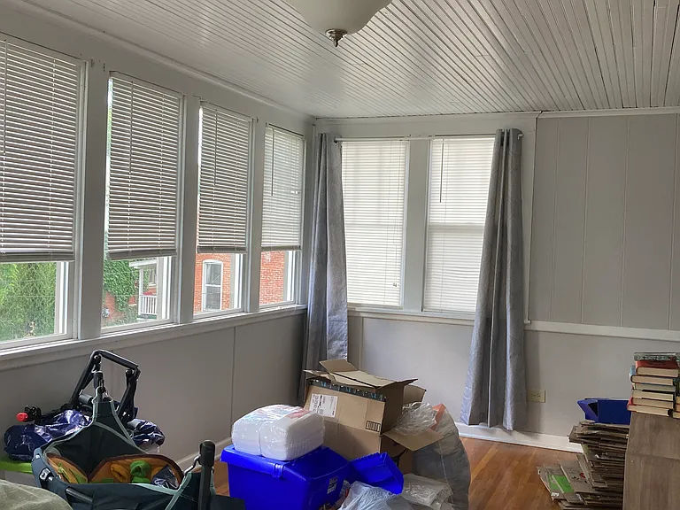 sunroom (with tenant belongings)