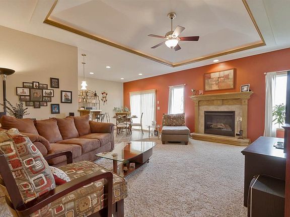 Great family room with trey ceiling and accent lighting, gas log fireplace, upgraded carpeting with saturated color for stain resistance and memory foam padding for added comfort!