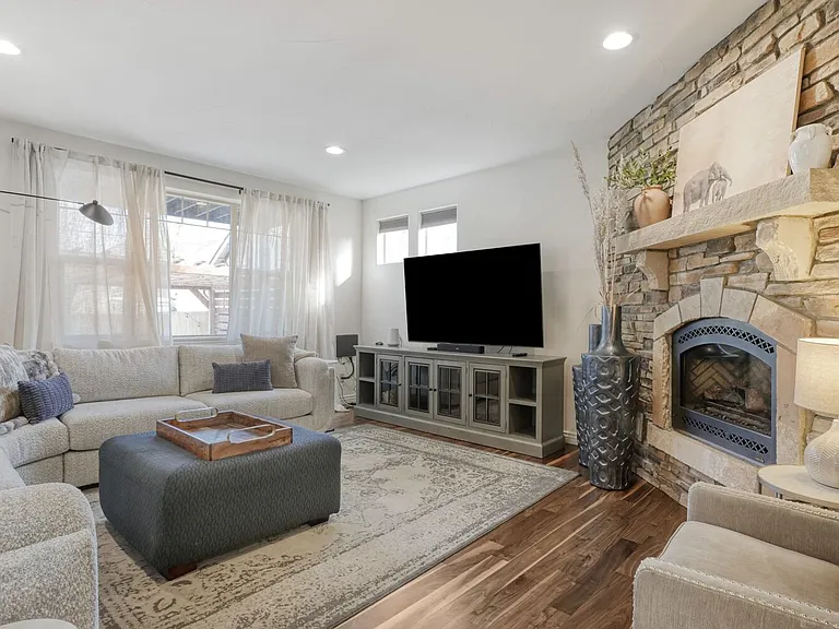 MAIN LIVING ROOM WITH 75" INCH TV