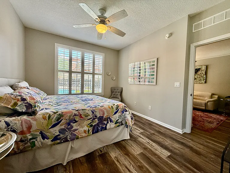 Oversized primary Sweet with garden tub and shower, vanity with modern mirrors lighting and walk-in closet