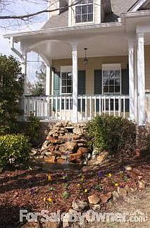 Lovely Front Covered Porch : Enjoy sitting on your porch hearing the peaceful sound of the water fou