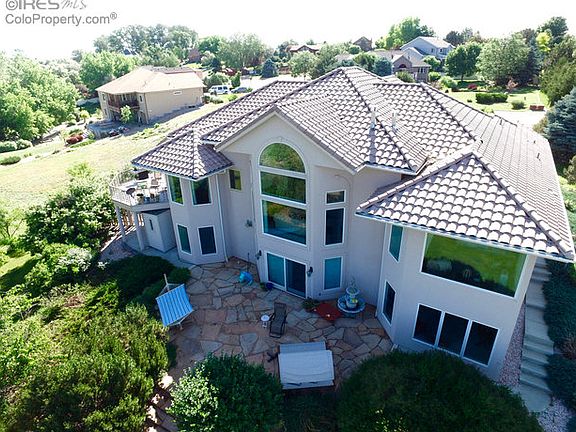 Rear view of patio and home