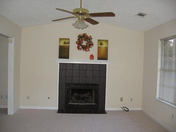 Great gas starting fireplace with classic black surround.