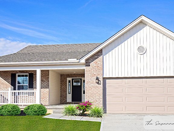 The Savannah with Brick in Castleton and Board Batten Siding in Natural Linen