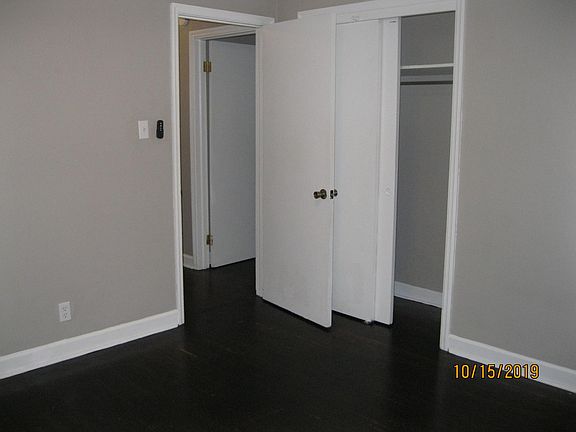 Hallway to 2nd bedroom and closet in bedroom #1