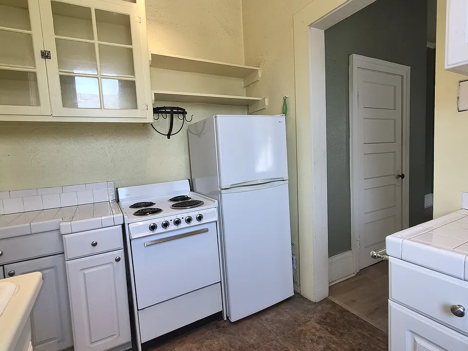 Quaint kitchen with everything you could need.