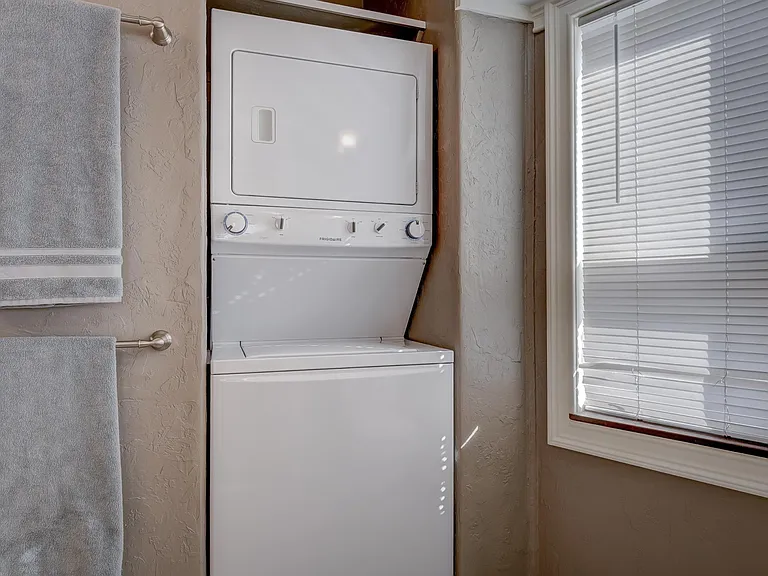 Washer dryer in first floor bathroom.