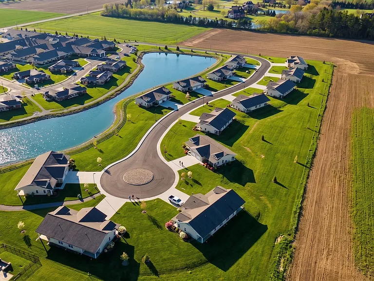 Beautifully landscaped community offering maintenance-free living, vibrant social opportunities, and access to dining, wellness, and lifestyle experiences.