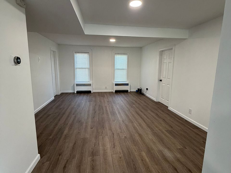 Large living room with recessed lighting