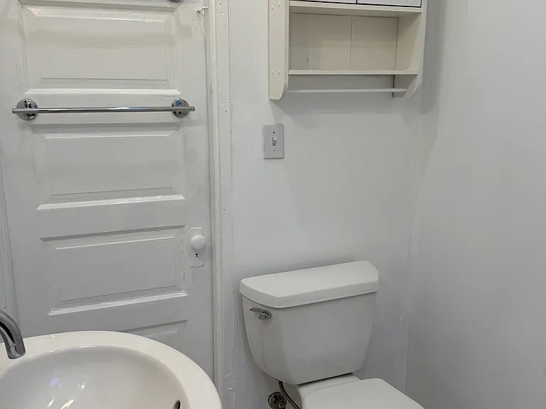 2nd Floor Bathroom (situated in between the 2 back bedrooms) boasts a pedestal sink, shower/tub and new toilet. Again, making this house convenient to share w 2 people, since the back two bedrooms make for a private nook, close to the bathroom