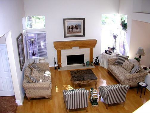 View of Living Room with Marble Finish Fireplace