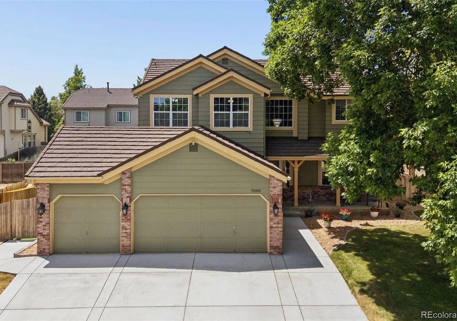 Beautifully Remodeled 6-Bed, 4-Bath Luxury Home in Columbine Knolls South Neighborhood With 3-Car... — Photo 1
