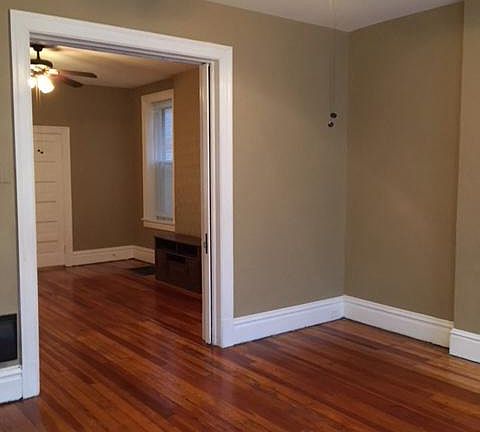 Looking towards Dining Room w/Ceiling Fan and Pocket Door