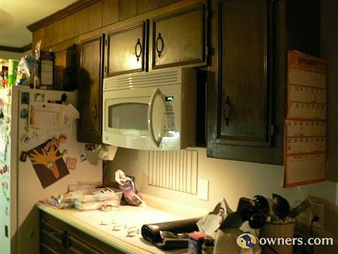 Kitchen cabnets , stove, & microwave