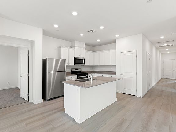 This home comes with all stainless steel appliances included.