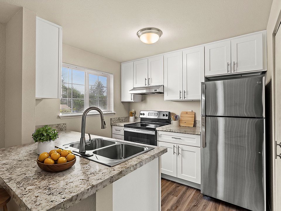 Experience the elegance of modern kitchen design with top-of-the-line finishes and fixtures.