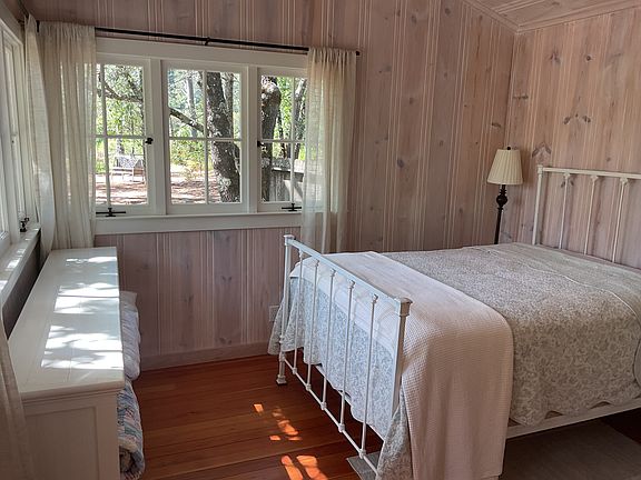 Bedroom with door to private patio.