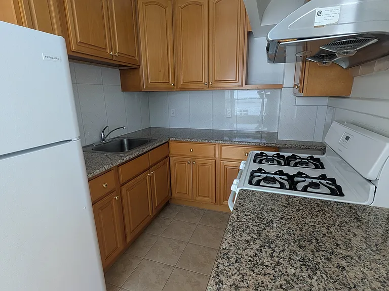 kitchen, including lots of cabinet space and gas stove