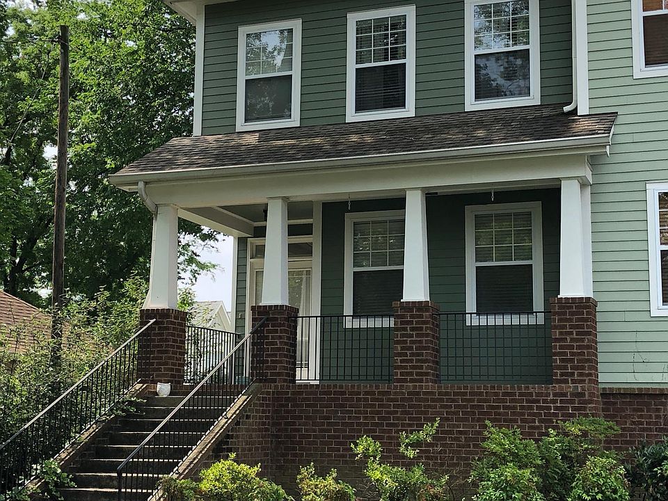 Front of house with large covered front porch