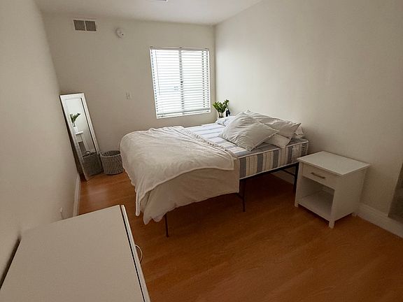 Large Bedroom High slanted ceilings