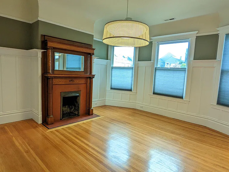 Living Room with Decorative Fireplace, in the back of the flat