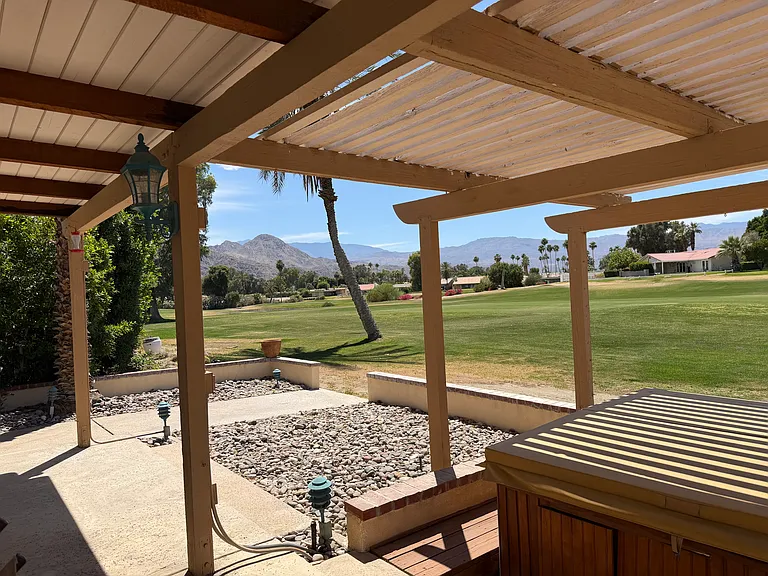 Beautiful Southern exposure on the fairway with full panoramic Mountain Views! Large Hot Tub