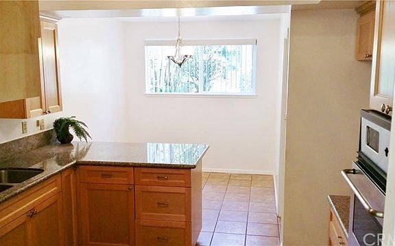 Kitchen looking into Breakfast Room