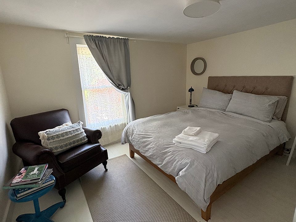 Bedroom #1 with Queen bed and closet on second floor.