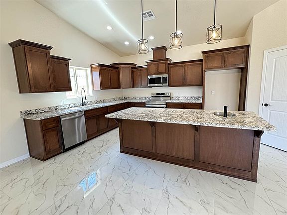 5th image of 12164 E 35th Pl