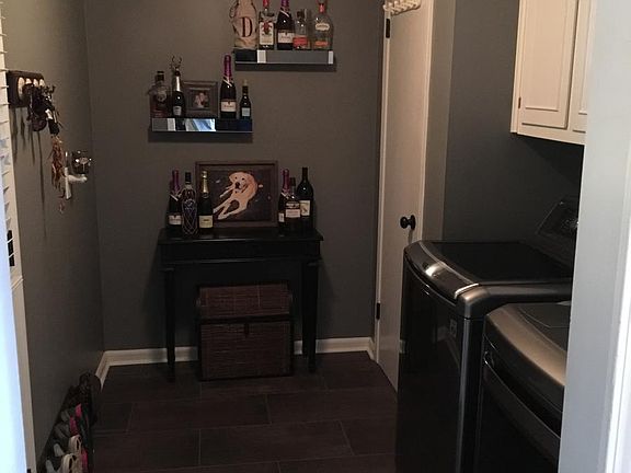 pantry/laundry, with new, full-size machines (flooring has b