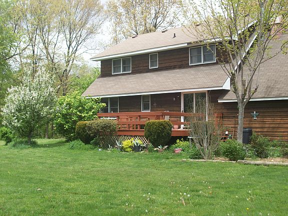 see 4 acres, creek from deck