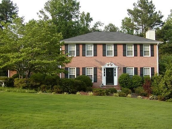 Low Maintenance Brick with Concrete Siding and Side Entry Garage