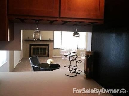 Kitchen Pass thru
						:
						Opens to the dining and living areas.