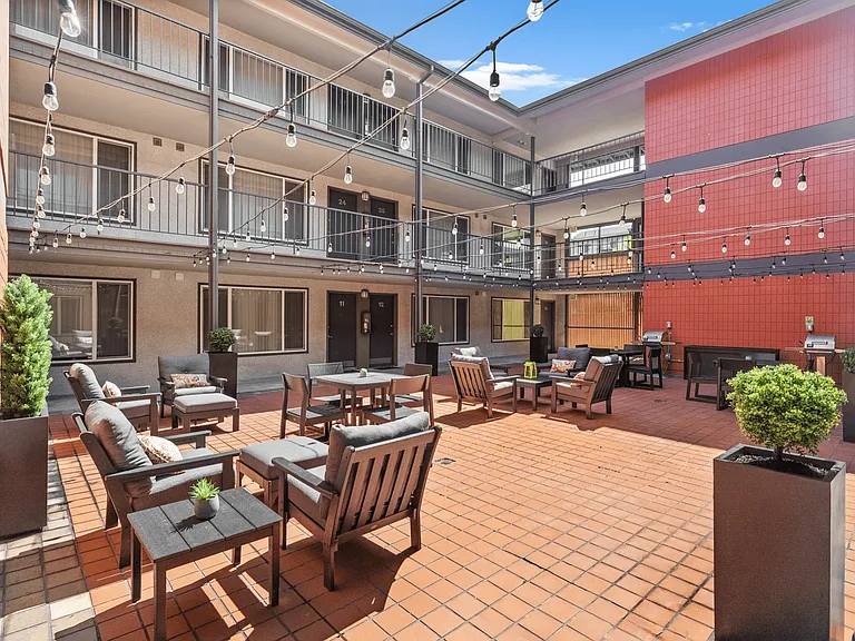 Relax and unwind in our welcoming resident courtyard with comfortable seating.