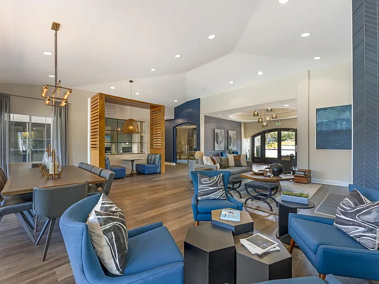 The clubhouse at Ascent at the Galleria is welcoming to all, offering plenty of comfortable seating for residents and guests to gather, relax, and enjoy time together.