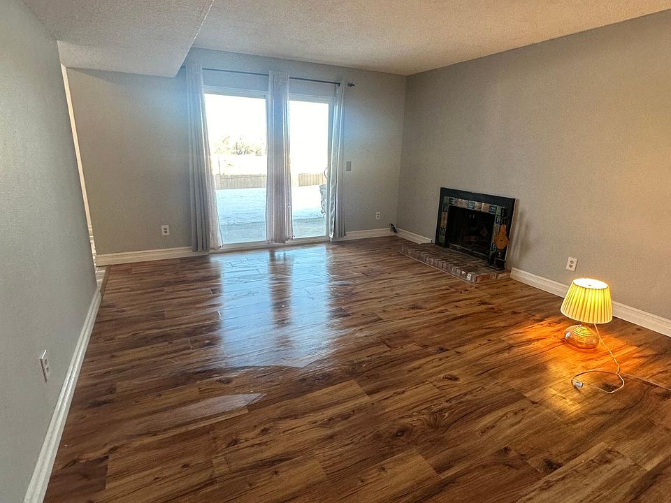 Living room, looks out to patio and shared backyard.