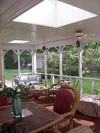 Lg back screen porch with skylights and ceiling fan