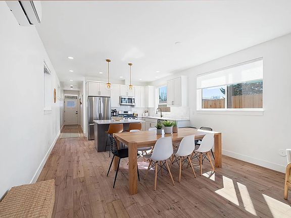 Dining Area | Dining Table & Kitchen Island | Seating for 10 | 1st Floor