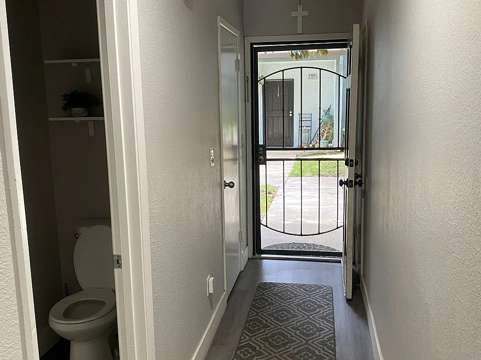 Hall entrance with half bath.