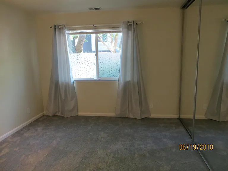 Master Bedroom; new shades, new drapes, new carpets, new bas