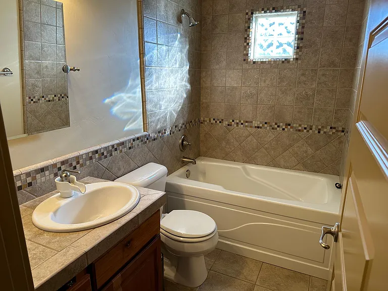 Full bathroom in upstairs hallway