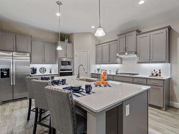 All photos shown here may not depict the specified home & features included are for illustration purposes only.